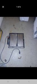 Electric tile cutter with tiling trowel
