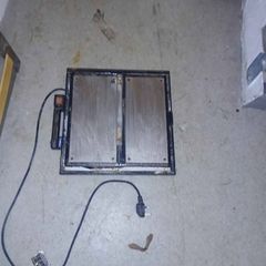 Electric tile cutter with tiling trowel