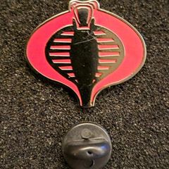 Cobra,  pin back badge.