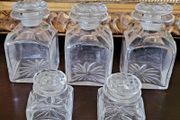 Antique set of five cut glass scent bottles