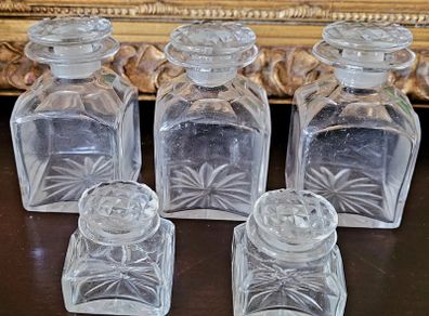 Antique set of five cut glass scent bottles