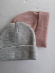2 new beanie hats sticker attached