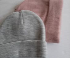 2 new beanie hats sticker attached