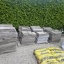 30sq m used 300mm x 600mm paving slabs & paving sand Image 3