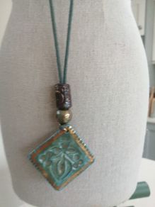 Handmade Celtic ceramic pendants