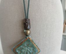 Handmade Celtic ceramic pendants