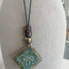 Handmade Celtic ceramic pendants