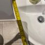Bathroom sink, toilet, radiator Image 3