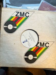 Selling off my rare U2 collection from Zimbabwe. This is another rattle and hum. I believe this to be a Zimbabwe promo as it comes in a ZMC sleeve. Zimbabwe Music Company. Vinyl condition is vg