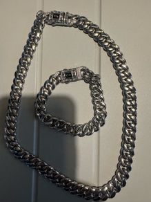 silver  colour bracelet and necklace