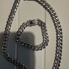 silver  colour bracelet and necklace