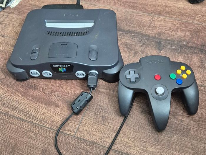 Nintendo 64 console with controller and cable
