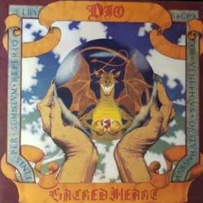 DIO Sacred heart original1985  Rare Irish translucent version. Vinyl goes golden brown when a bright light is shining through it. Has original inner lyric sheet vinyl record