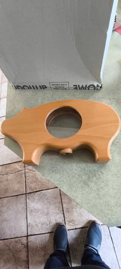 wooden piggy bank featuring a clear viewing window so you can see your savings grow.