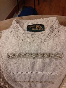 Handknit sweater.