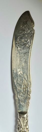 Sterling silver knife, 1901, fully silver inc blade. Intricate decoration.