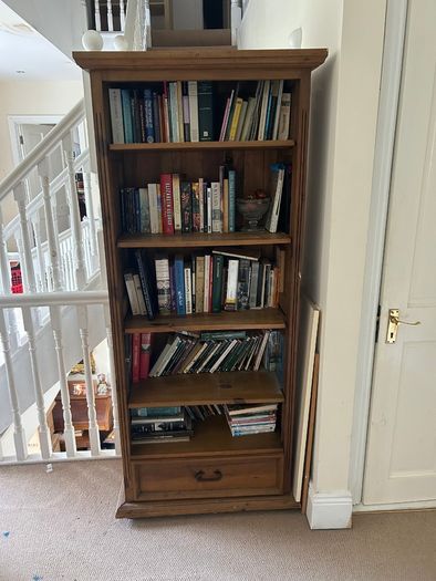 Solid wood bookshelf with bottom drawer