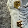 Air Jordan 4 White and Gold Trainers Image 9