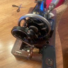Old Vesta sowing machine with cover
