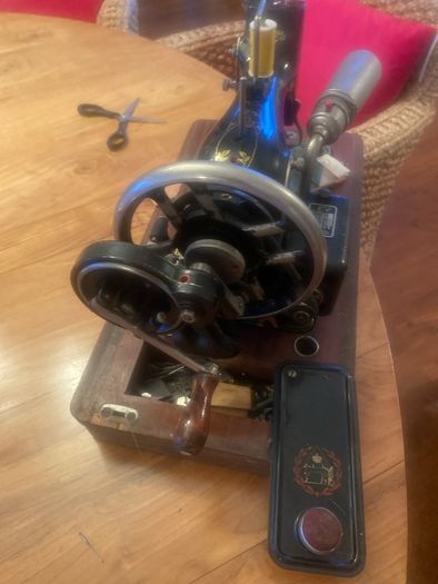 Old Vesta sowing machine with cover