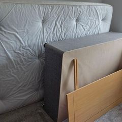 double bed with mattress and headboard