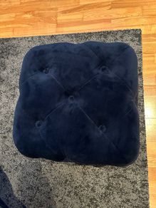 Navy blue velvet upholstered cube pouffe