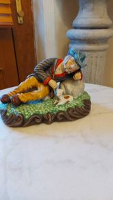 Figurine  man and his dog.