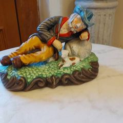 Figurine  man and his dog.