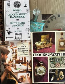 3 books on clocks including repairing dictionary guides and history. Price is for all 3