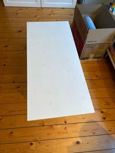 white table - needs a lick of paint but solid wood and very sturdy