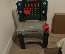 kids workbench, tools and hard hat