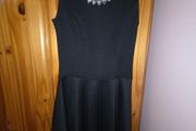 black dress with necklace