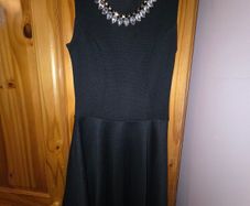 black dress with necklace