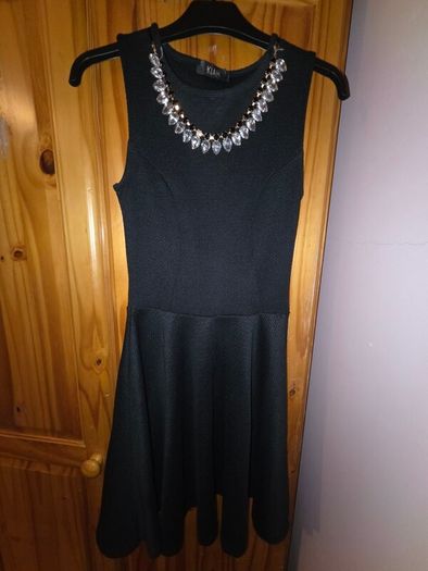 black dress with necklace