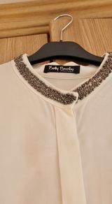 Silk style top with embellished neckline