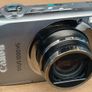 Canon IXUS 1000 HS Digital Camera (High Sensitivity 10 Megapixel, 10x Zoom, 3.0 inch LCD Screen) - Grey Image 6