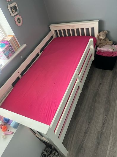 white wooden single bed