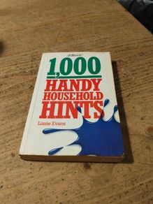 vintage 1980s paperback copy of 1000 Handy Household Hints by Lizzie Evans.