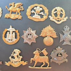 16 different British Army cap badges