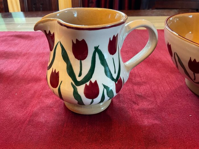 Nicholas Mosse Red lawn set of two , 4 inch jug and a 6 inch diameter bowl . Both have blemishes but perfect for  display