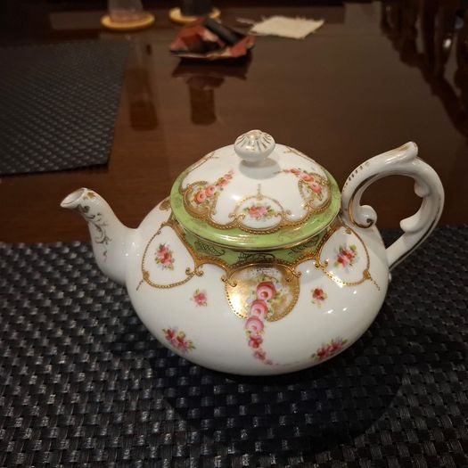 Antique tea pot sugar bowl and milk jug
