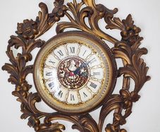 Vintage  Highly Ornated gold tone Wall Clock  quartz size 68x39cm