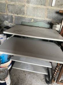 Computer desk with sliding keyboard tray