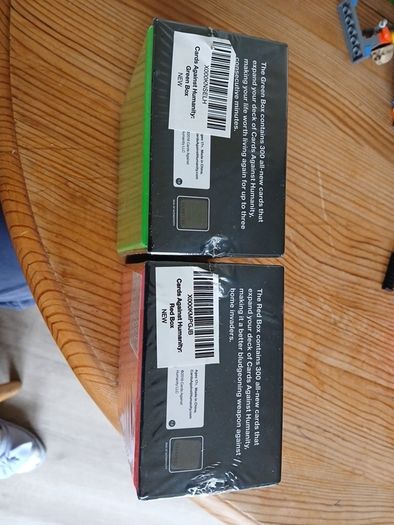 Cards Against Humanity Expansion Set Red Box and Green Box Brand New Sealed