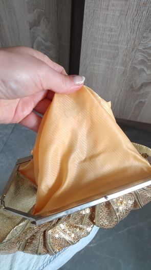 Gold sequin with rinstones clutch
