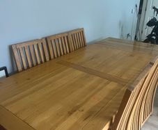 Solid Oak extending dining table and chairs