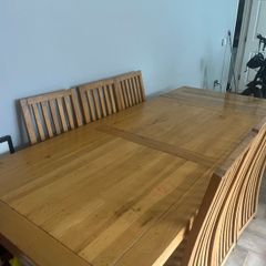Solid Oak extending dining table and chairs
