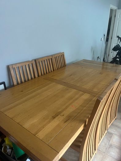 Solid Oak extending dining table and chairs