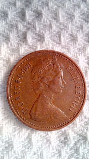 1971 U.K. New Penny plus 1971 Two New Pence.