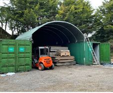 2 x 20ft storage containers and dome shelter